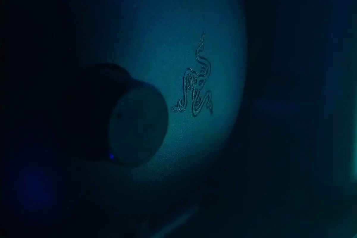 A headset on a lit desk, where the studio answers players